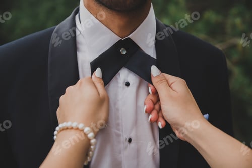Preview: Groom at wedding tuxedo in the forest