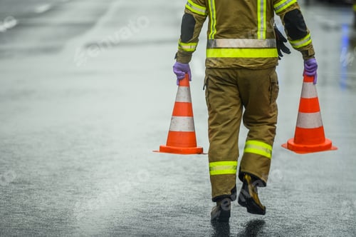 Preview: Highway Worker Preparing For Road Closure Moving Two Traffic Cones