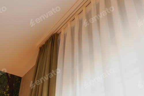 Preview: Soft natural light filters through sheer and solid curtains in a tranquil indoor setting