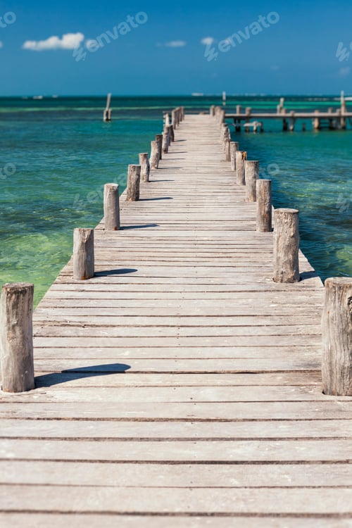 Preview: A long wooden jetty or pier,stretching out over the water