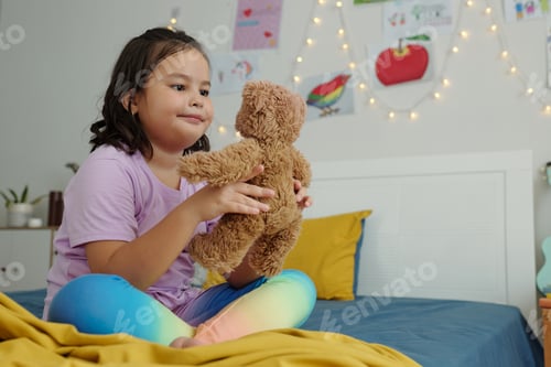 Preview: Girl Playing With Her Favorite Toy