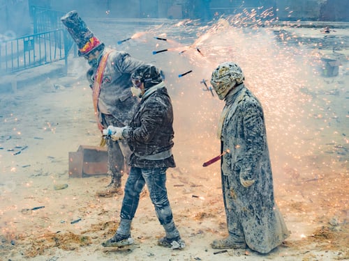 Preview: Ibi, Spain - December, 28 2018: People celebrating victory in flour and eggs battle