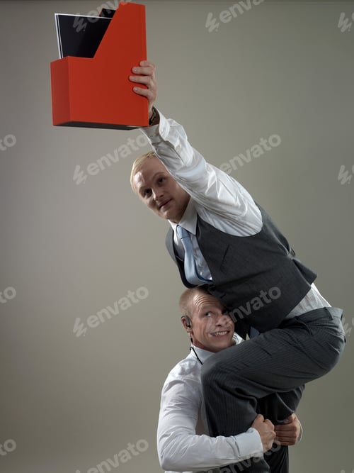 Preview: Business men placing paper holder