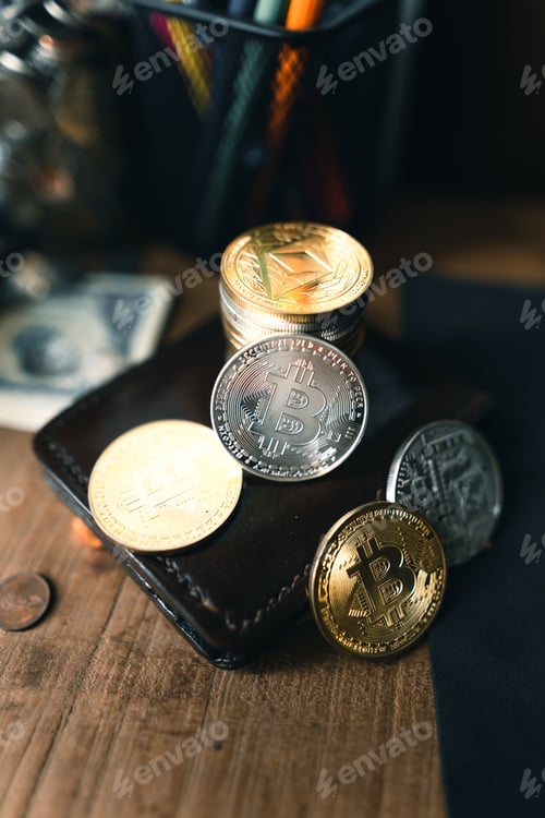 Preview: Bitcoin coins on a wooden desk at home