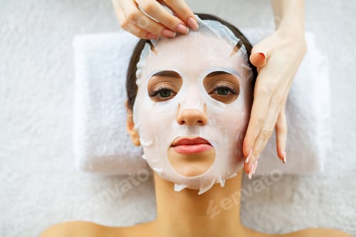 Preview: Beautiful Woman Lying With Face Mask.
