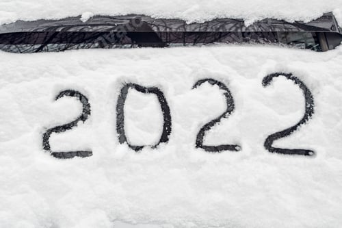 Preview: Number 2022 is symbol of next New Year, written freshly fallen snow that lies on windshield of car