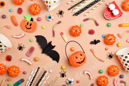 Preview: Various sweets on an orange background with a place for text.