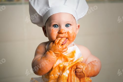 Preview: Cheerful child having fun with pasta