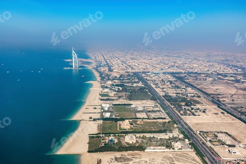 Preview: Burj Al Arab hotel in Dubai UAE aerial view at sunset