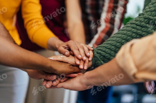 Preview: Group of Hands Together Symbolizing Unity and Cooperation