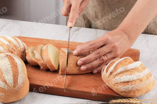 Preview: Female Hand Slice Bread