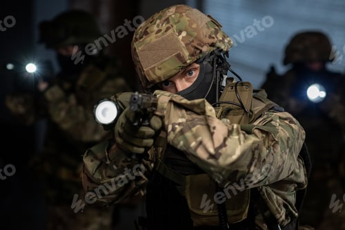 Preview: Group of men with lanterns and guns