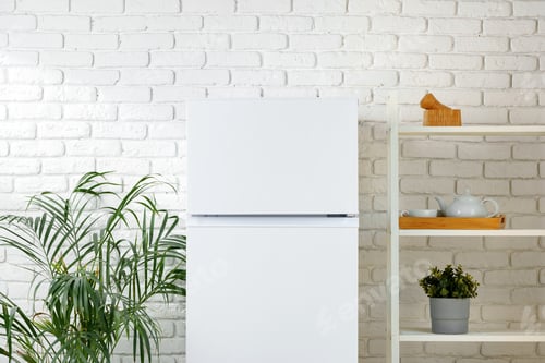 Preview: White Refrigerator In A Modern Kitchen With Brick Wall