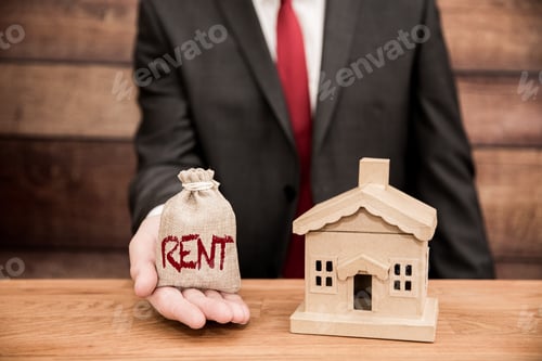 Preview: A housing concept of a landlord or home owner with a bag of money for rent and real estate agent