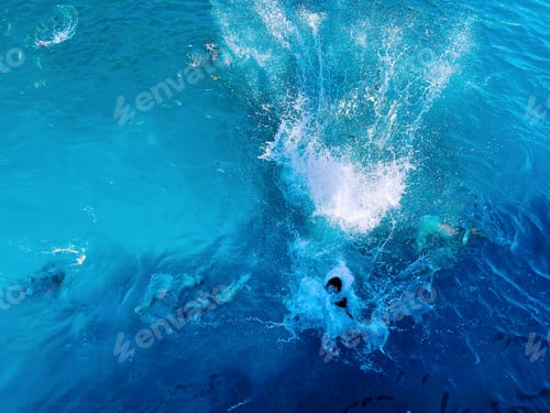 Preview: Aerial view of the sea with a lot of splashes
