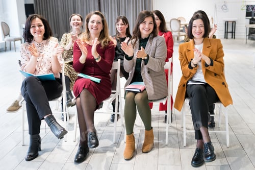 Preview: Group of people clapping their hands during seminar.
