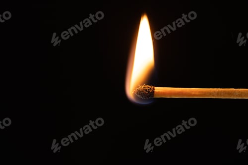Preview: Close up of lit match with copy space on black background