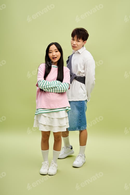 Preview: Stylish couple expresses love and romance through vibrant fashion in playful studio setting