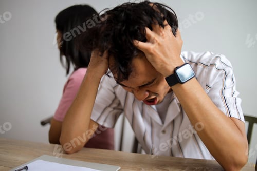 Preview: Portrait of Sad Spouses Couple Signing Decree Papers Getting Divorced in Lawyer's Office Desk
