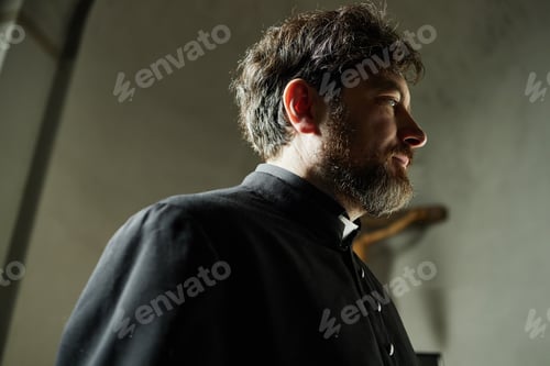 Preview: Caucasian Middle Aged Man Serving as Priest Inside Church Sanctuary