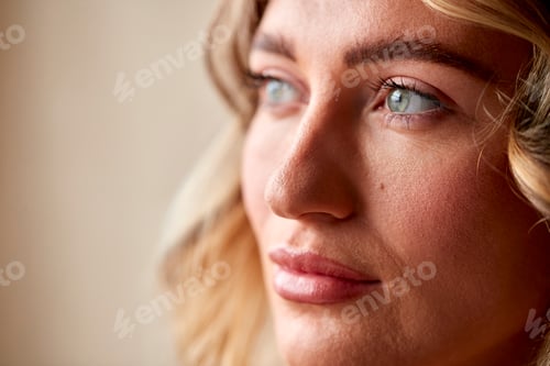 Preview: Studio Portrait Shot Face And Eyes Of Confident Natural Woman
