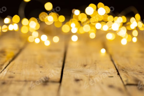 Preview: Image of christmas out of focus fairy lights and copy space on wooden background
