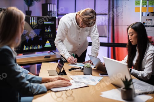 Preview: Diverse traders during working process at office