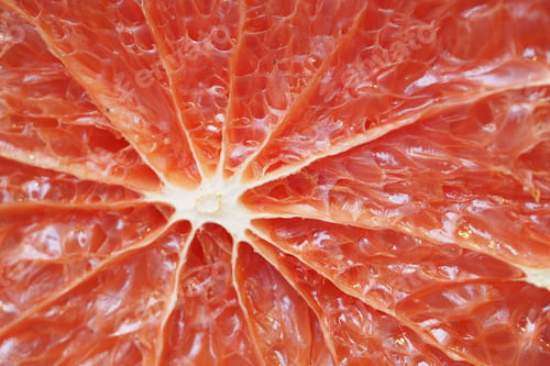Preview: Close-up of ripe grapefruit revealing juicy segments