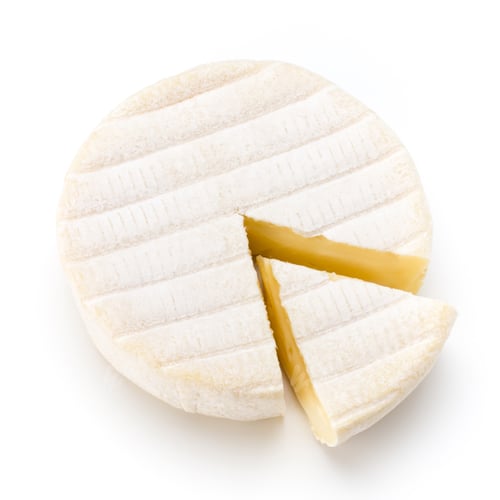 Preview: Piece of camembert cheese isolated on white background. From top view.