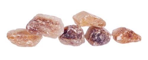 Preview: Pile of brown granulated sugar isolated on white background