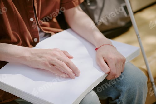 Preview: Male Hands Holding Book
