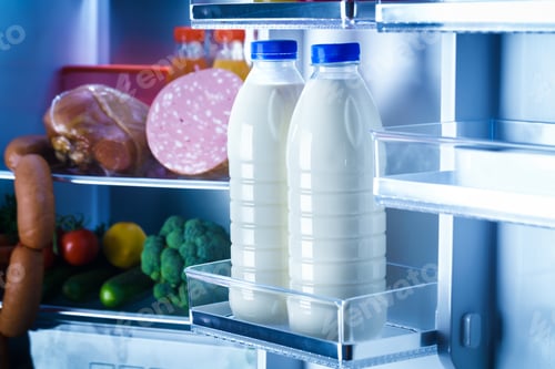 Preview: Open refrigerator filled with food