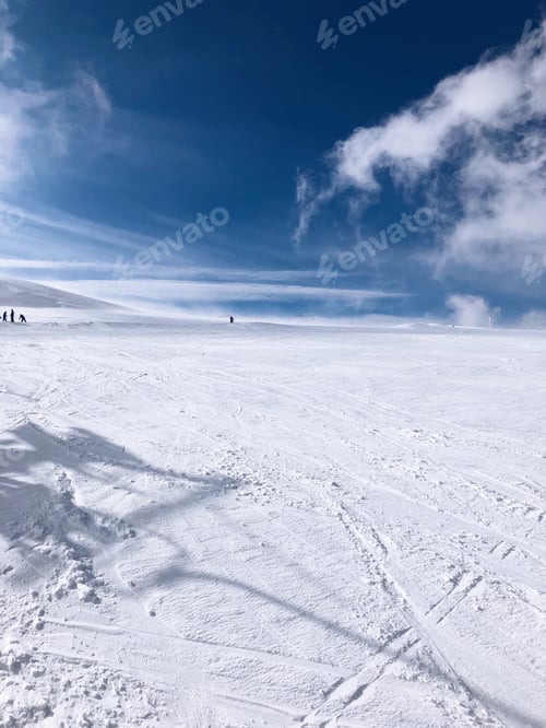 Preview: Winter landscape with shadows of a chairlift