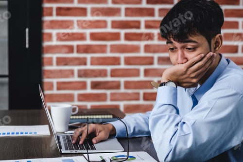 Preview: asian businessman get stress and headache when working with laptop