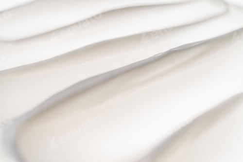 Preview: White cream texture on a white background.