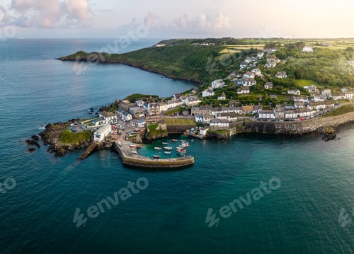 Preview: Aerial landscape of the Cornish fishing village of Coverack at sunset