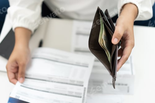 Preview: Worried unemployment woman open empty wallet on payday