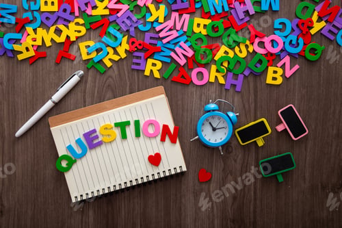 Preview: Color aplhabet with words Question on wooden background