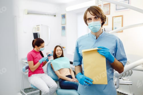 Preview: dentist with documents in hands