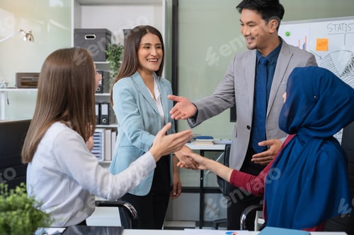 Preview: business people working as a good team in the office. Successful teamwork in a meeting