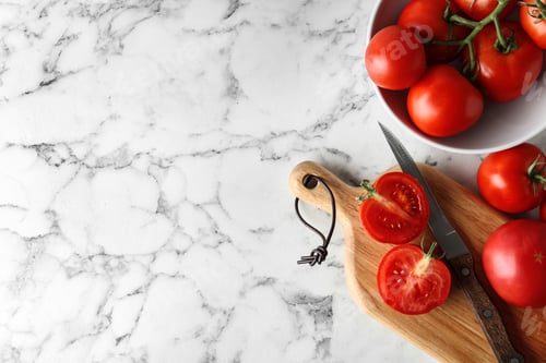 Preview: Flat lay composition with fresh ripe tomatoes on marble table. Space for text