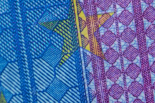 Preview: Macro focus shot of the blue and purple detail on the twenty euro banknote