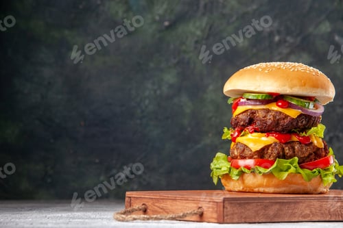 Preview: Tasty homemade sandwich on wooden board tied up with rope on blurred background with free space