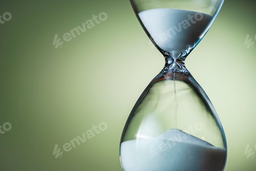 Preview: Sand running through the bulbs of an hourglass