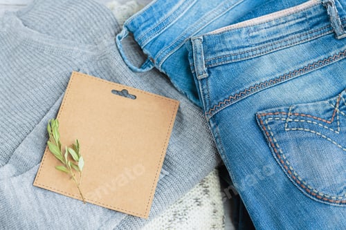 Preview: Sustainable still life with Blue denim jeans and empty craft card