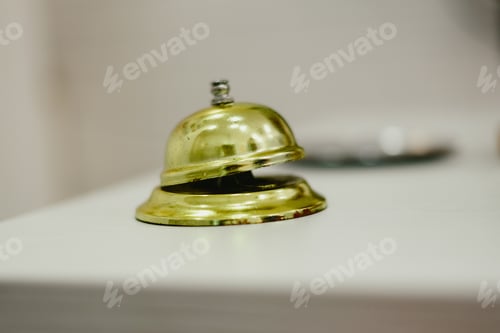 Preview: Old bell to call the bellman in a hotel, Service bell hotel golden.