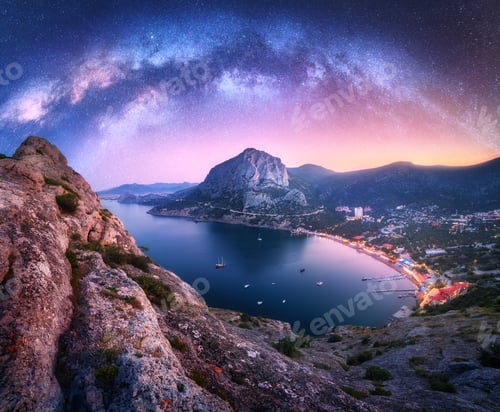 Preview: Arched Milky Way over the beautiful mountains and sea at night