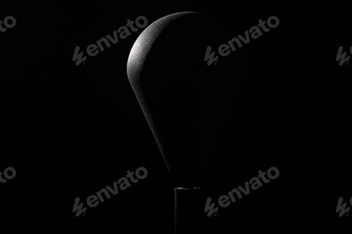 Preview: Punching bag lit with dramatic lighting.