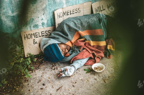 Preview: Beggars lying on the side of the street with dirty clothes.