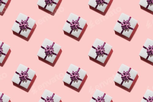 Preview: Seamless pattern of pink giftboxes with purple bow with shadow on pink.
